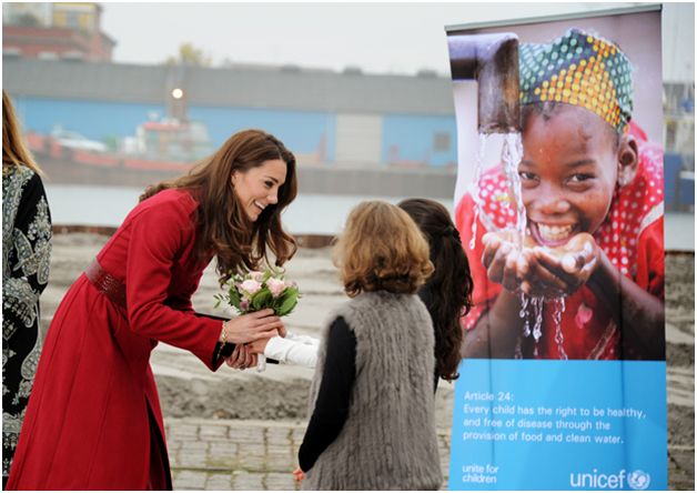 Image source:https://whatkatewore.com/2011/11/02/kate-in-red-lk-bennett-for-unicef-mission-first-tv-interview-a-break-with-tradition/